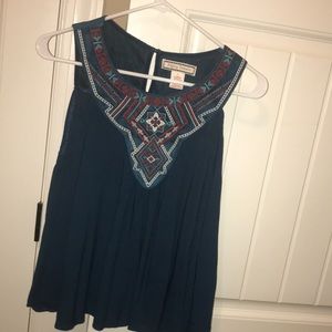 Size small blue suede. Shoulder cut out